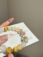 Additional view of natural Golden Tiger's Eye, Lemon Azeztulite (trade name) bracelet with 8mm beads with gemstone details