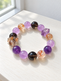 Natural amethyst, black gold Super Seven and smoky quartz bracelet with a double-terminated amethyst accent and 13mm beads