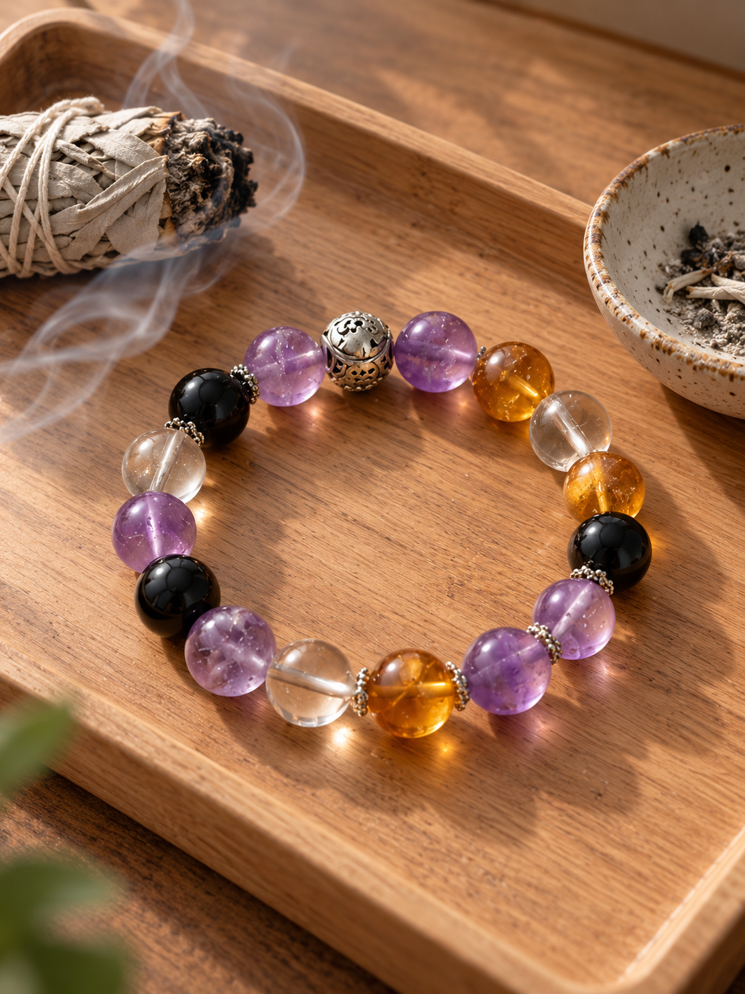 Capricorn zodiac crystal bracelet displayed in a minimalist crystal cleansing ritual setting