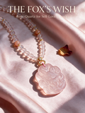 Rose quartz necklace with fox and lucky star charm called The Fox's Wish