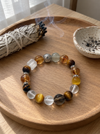 Gemini zodiac crystal bracelet displayed in a minimalist crystal cleansing ritual setting