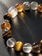 Close-up of Gemini bracelet with Tiger’s Eye, Clear Quartz, Golden Tiger’s Eye and Light Green Rutilated Quartz