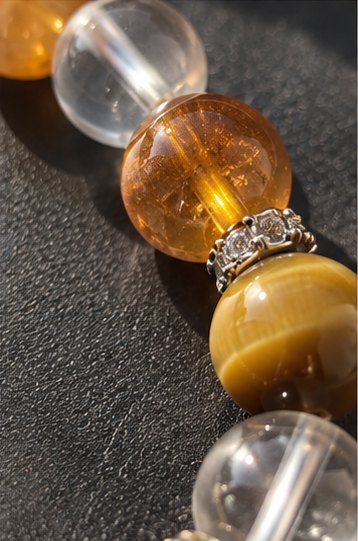 Close-up of Leo bracelet featuring Tiger’s Eye, Golden Flower Agate, Clear Quartz and Citrine