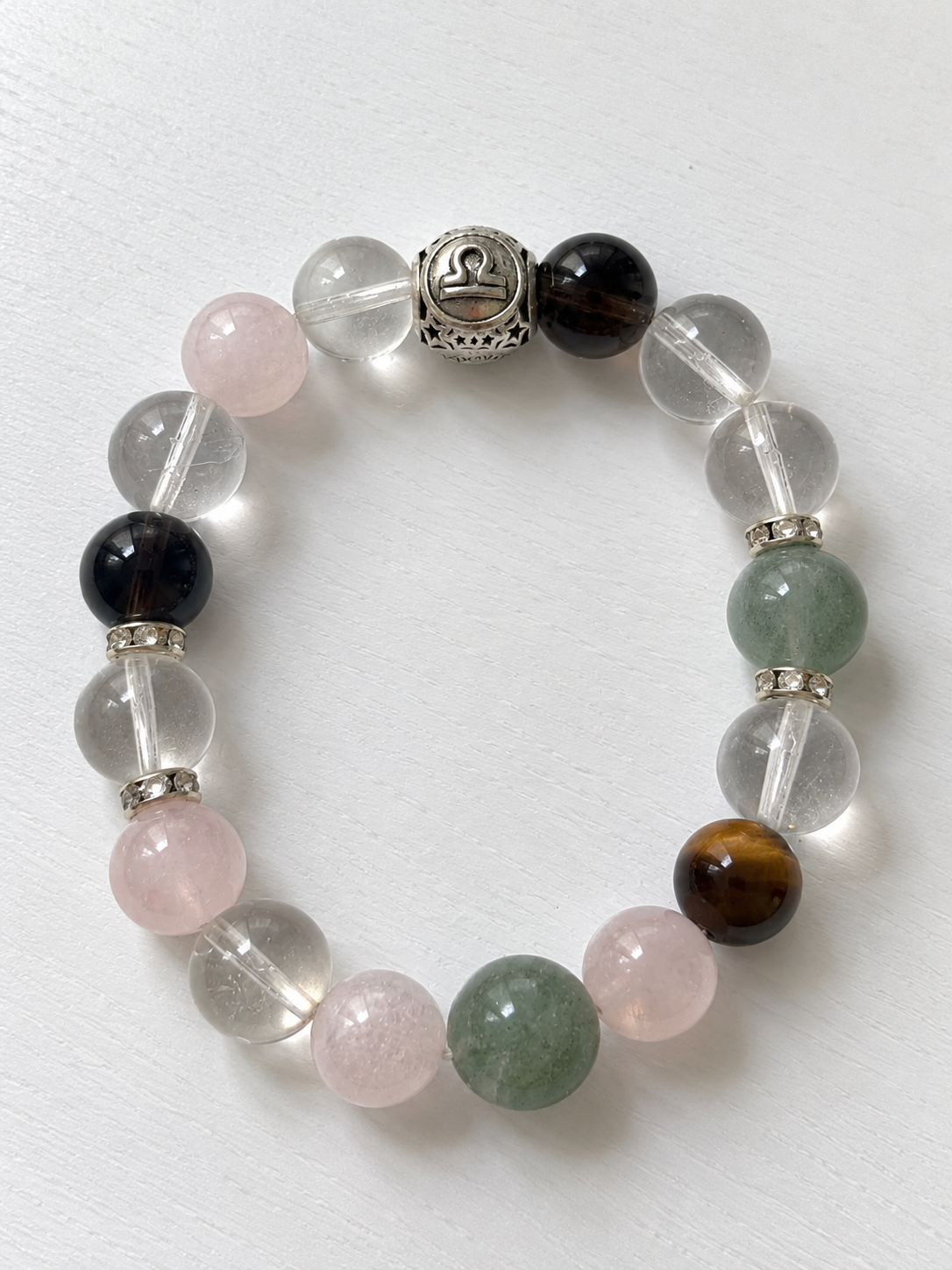 Libra zodiac bracelet with Clear Quartz, Green Phantom Quartz, Smoky Quartz, Tiger’s Eye and Pink Phantom Quartz